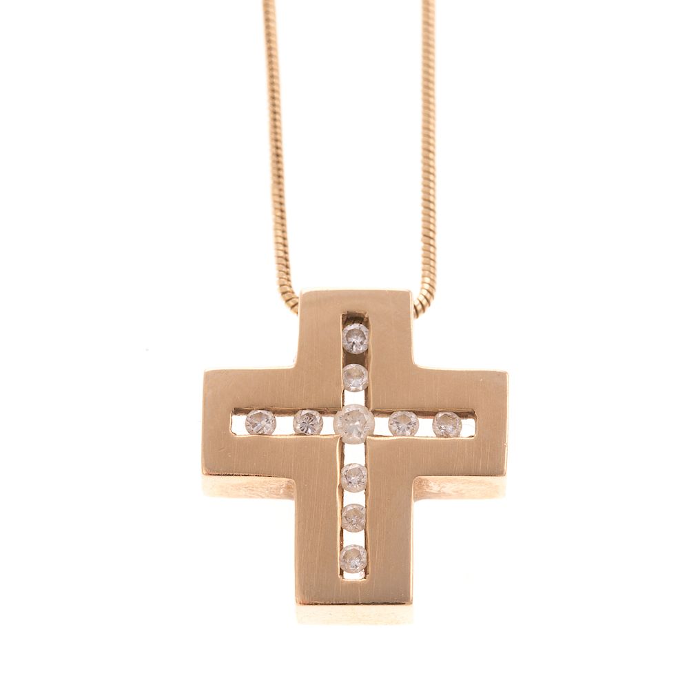 Appraisal: A Ladies Diamond Cross and Chain in K K yellow