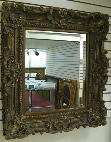 Appraisal: A BAROQUE STYLE RECTANGULAR BEVELED WALL MIRROR in light weight