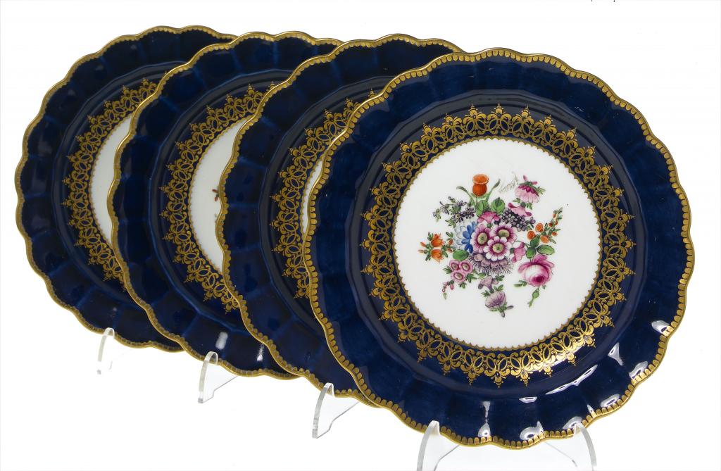 Appraisal: A SET OF FOUR ROYAL WORCESTER FLUTED BLUE GROUND DR