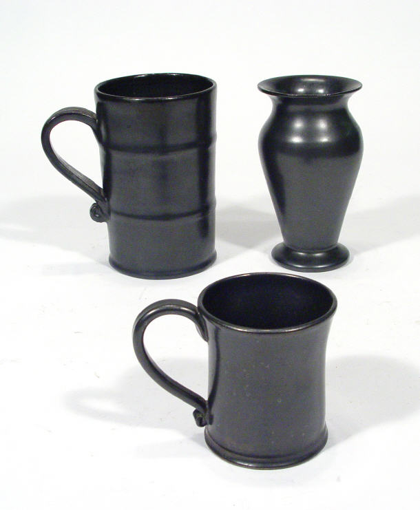 Appraisal: Dickerware black glazed tankard a mug and a similar vase