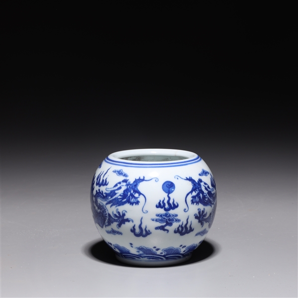 Appraisal: Small Chinese blue and white porcelain vessel with dragons chasing