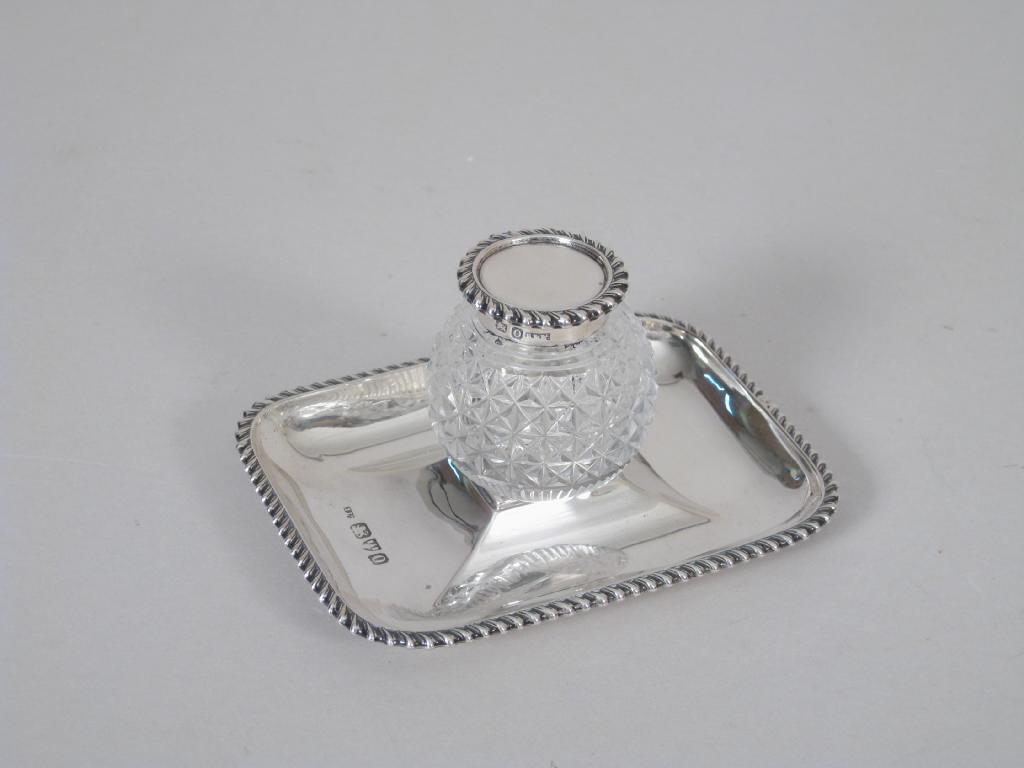 Appraisal: A Victorian small oblong Inkstand with cut glass ink bottle