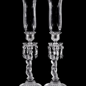 Appraisal: A Pair of Baccarat Glass Figural Candlesticks France th Century