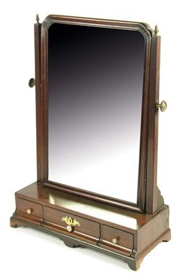 Appraisal: A mid th century mahogany dressing table mirror the later