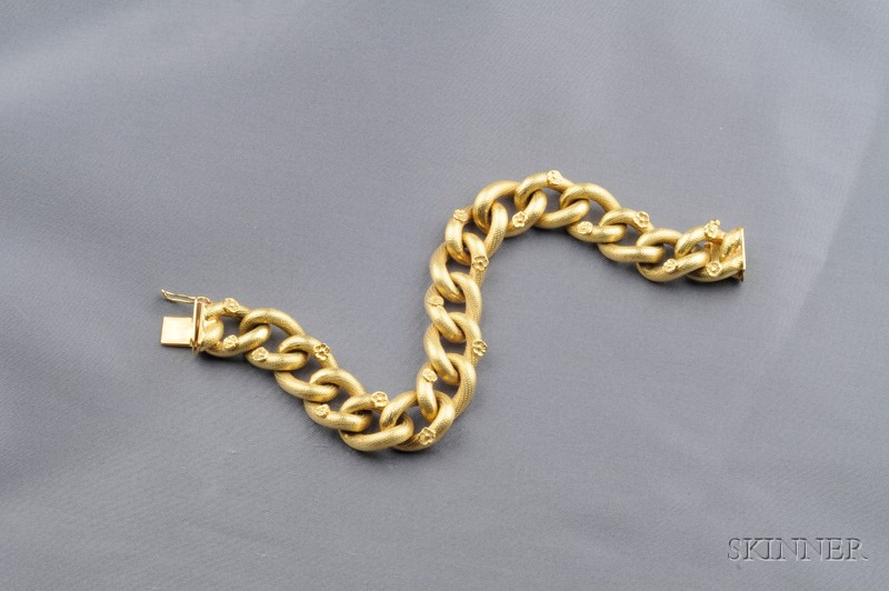 Appraisal: kt Gold Bracelet the engraved links with applied rosette motifs