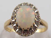 Appraisal: A carat gold opal and diamond ring opal approx x