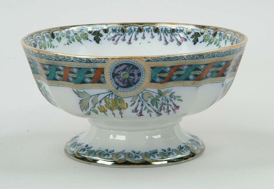 Appraisal: DECORATED IRONSTONE FOOTED PUNCH BOWL Castile pattern Bottom marked C