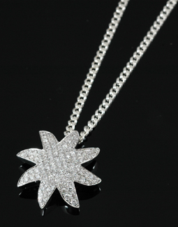 Appraisal: A pave set diamond pendant The starfish design set with