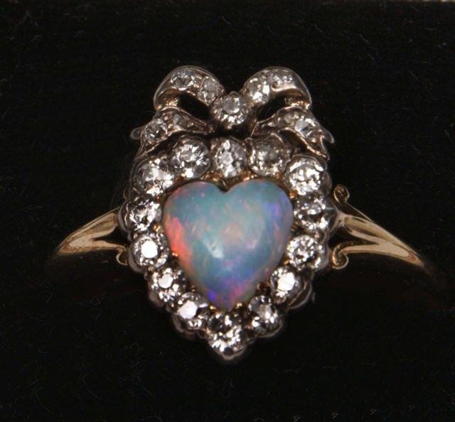 Appraisal: AN EARLY VICTORIAN OPAL AND DIAMOND SET RING heart shaped