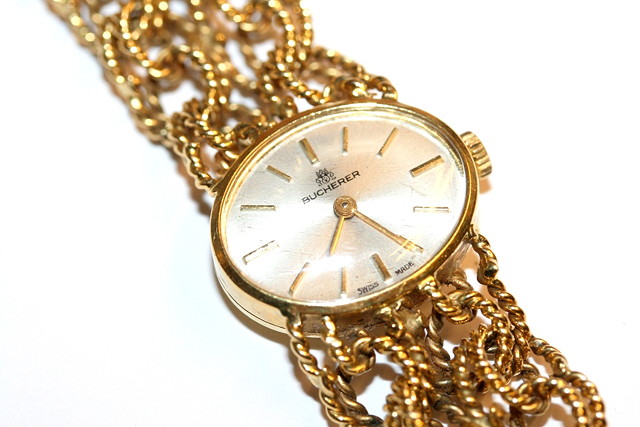 Appraisal: AN CT GOLD BUCHERE LADIES WRIST WATCH with an oval