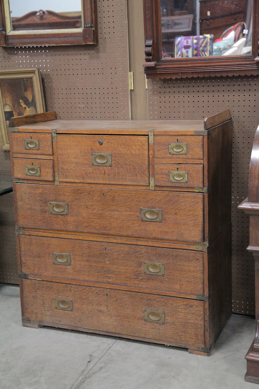 Appraisal: TWO PIECE CAMPAIGN CHEST Oak with brass hardware A butler's