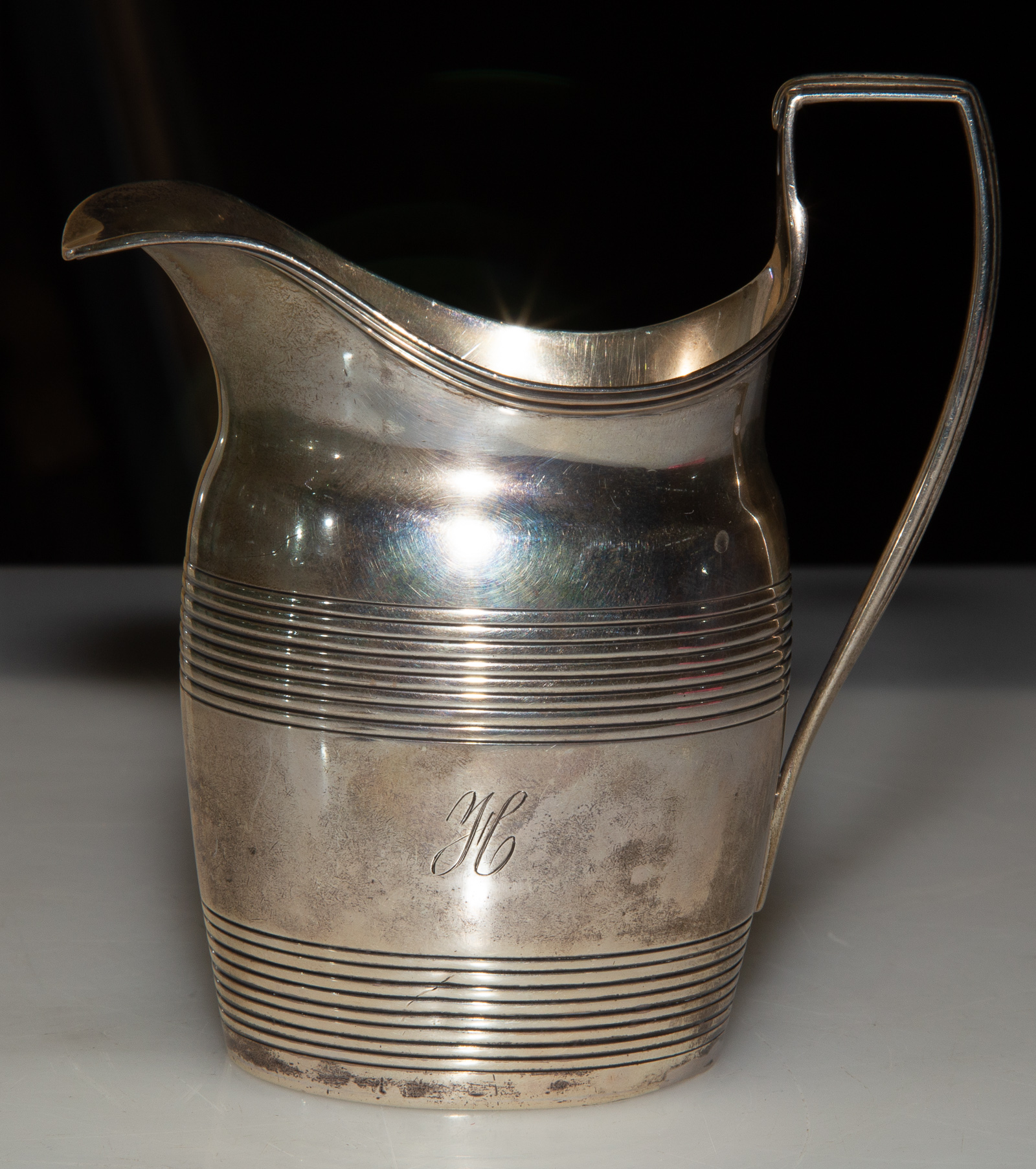 Appraisal: GEORGE III SILVER CREAMER London H monogram in H ozt