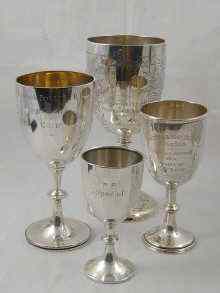 Appraisal: A group of four hallmarked silver trophy cups Weight oz