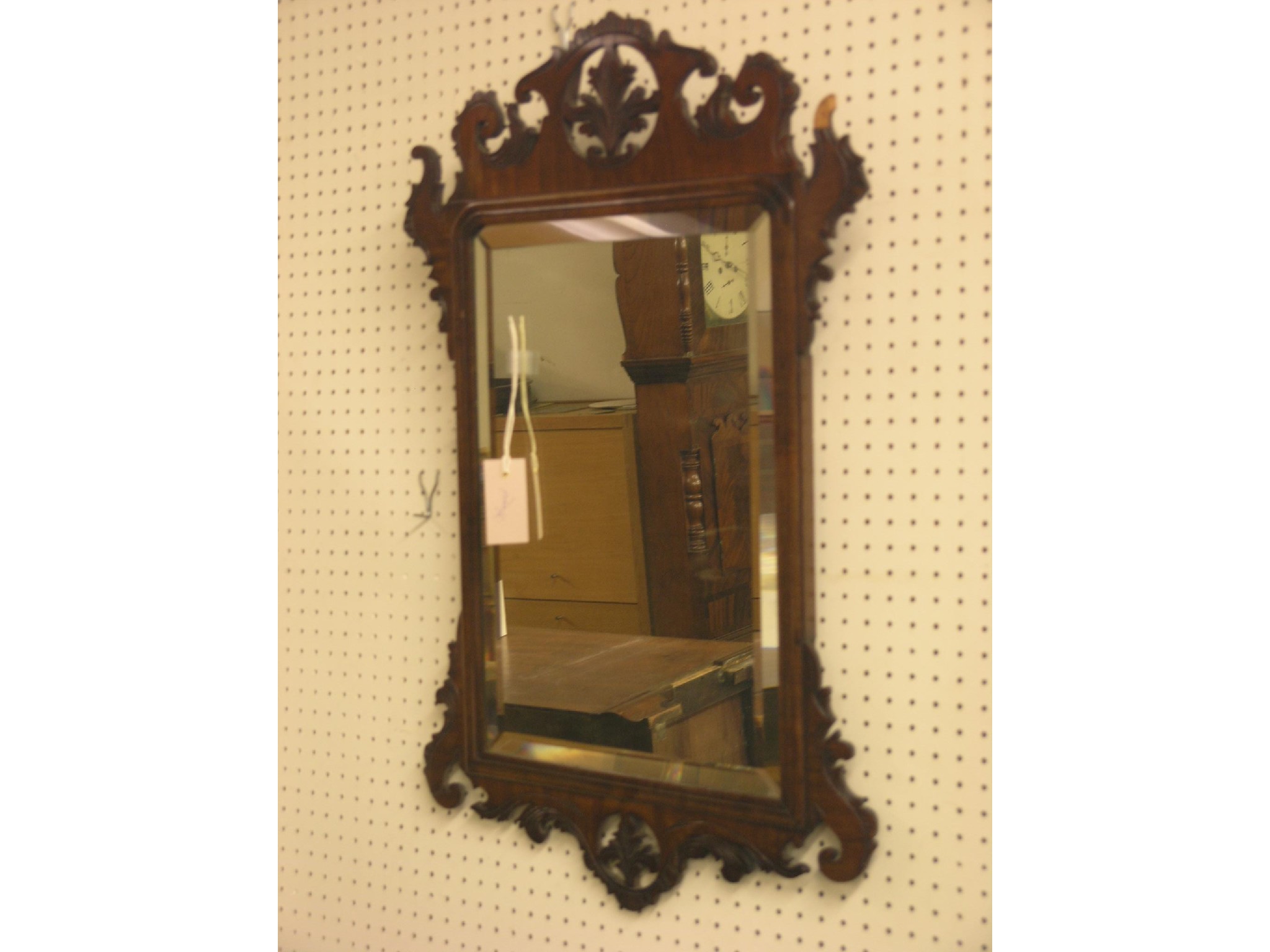 Appraisal: A Victorian Chippendale mahogany mirror boldly-shaped frame incised and fret-carved