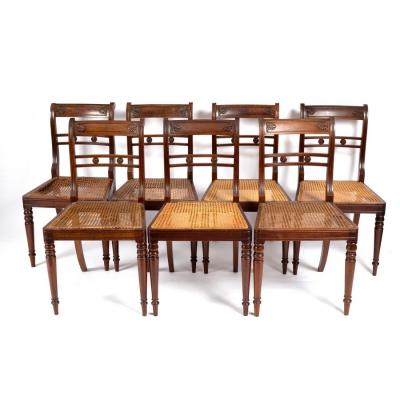 Appraisal: Seven Regency mahogany chairs circa the moulded oblong top rails