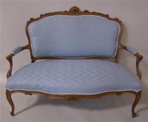 Appraisal: LOUIS XV STYLE SETTEE the shell and leaf carved foliate