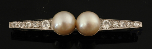 Appraisal: A cultured pearl and diamond brooch Comprising two cultured pearls