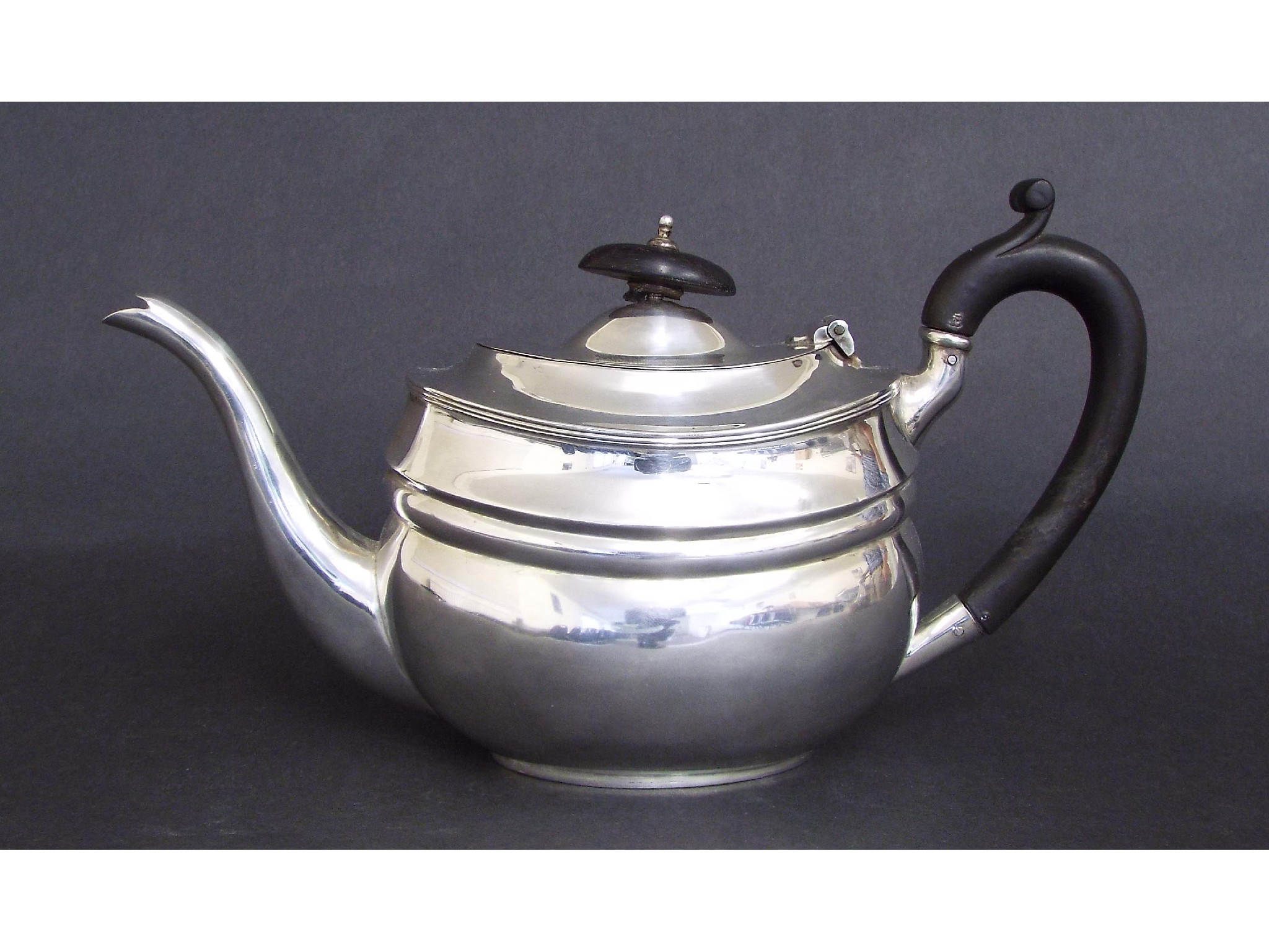 Appraisal: George V silver boat shaped bachelor teapot maker S Blanckensee