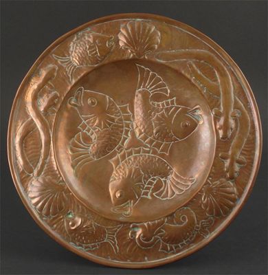 Appraisal: An Arts and Crafts copper plate hammered in relief with