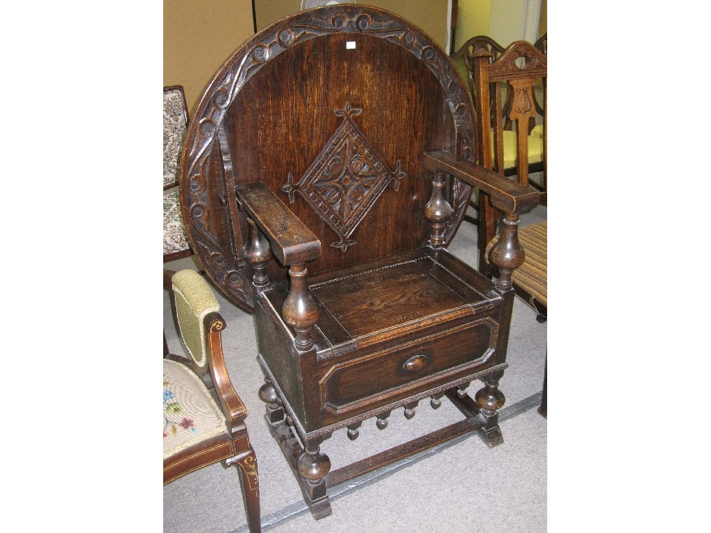 Appraisal: Carved oak hall settle