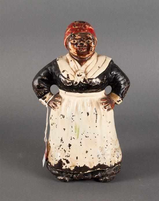 Appraisal: Cast iron ''Mammy'' doorstop early th century in H Estimate