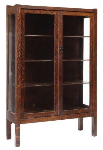 Appraisal: American Arts and Crafts oak china cabinet Peoples Furniture Company