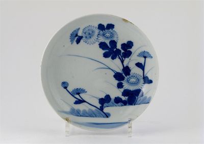 Appraisal: A Japanese Nabeshima blue and white dish painted with a