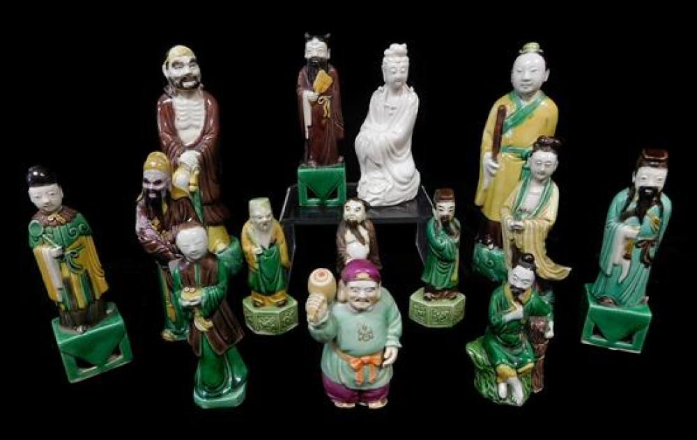 Appraisal: ASIAN Fourteen porcelain robed figures Chinese late th th C