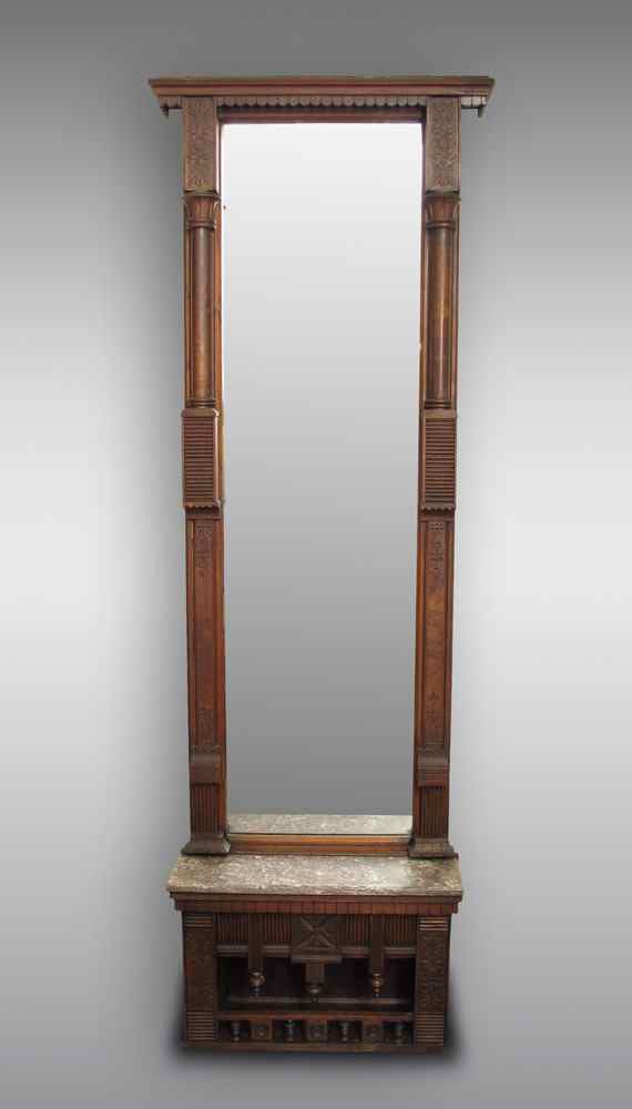 Appraisal: VICTORIAN WALNUT PIER MIRROR Dentil molding to crest sides with