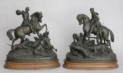 Appraisal: AFTER WAAGEN A PAIR OF EQUESTRIAN HUNTSMEN Bronze-patinated metal each