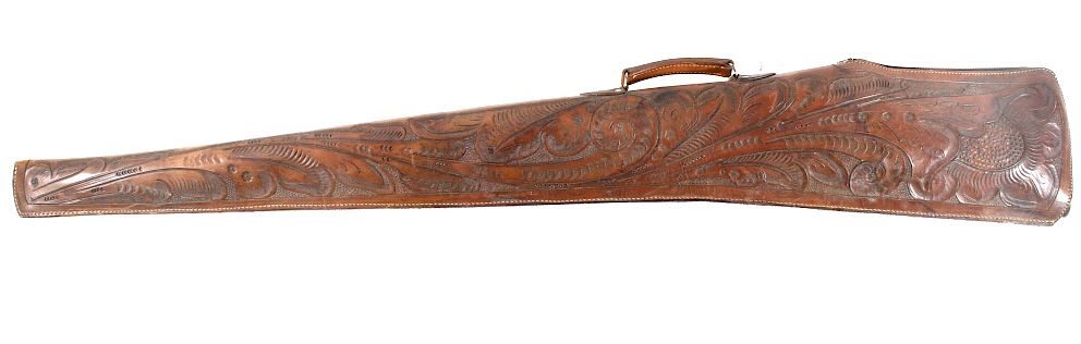 Appraisal: Rustic Western Hand Tooled Leather Rifle Scabbard Featured in this