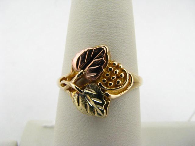 Appraisal: K Black Hills Gold grape and leaf motif ring dwt