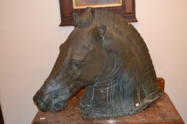 Appraisal: A BRONZE STATUE MODELLED AFTER THE THE HEAD OF ALEXANDER