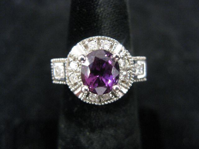 Appraisal: Purple Sapphire Diamond Ring scarce carat oval gem surrounded by