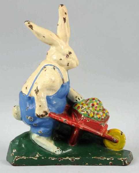 Appraisal: Cast Iron Rabbit Pushing Wheelbarrow Doorstop Littco Products Depicts rabbit