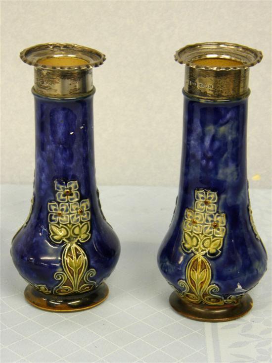 Appraisal: Pair of George V silver mounted Royal Doulton vases with