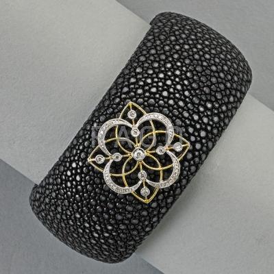 Appraisal: STINGRAY LEATHER CUFF WITH DIAMOND ORNAMENT k gold wide Condition