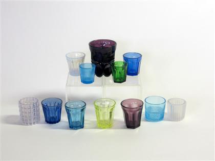 Appraisal: Twelve colored glass items th century Including a purple glass