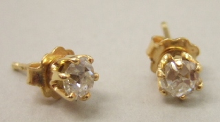 Appraisal: A pair of ct gold and diamond set single stone