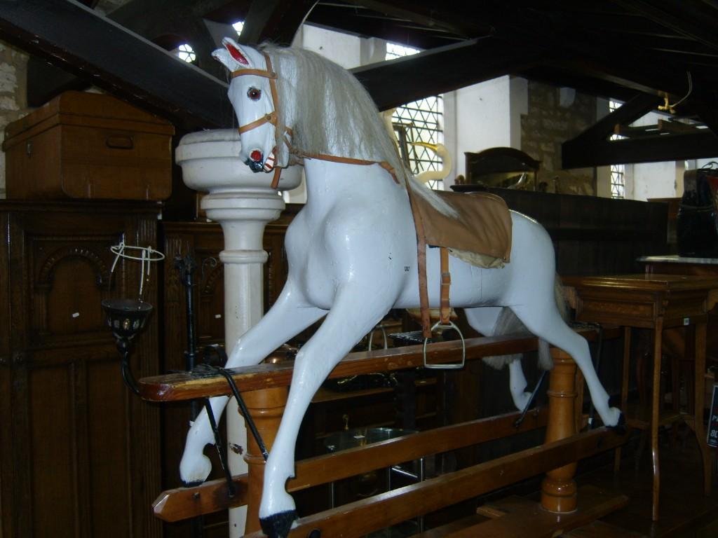 Appraisal: A substantial painted rocking horse on pine frame