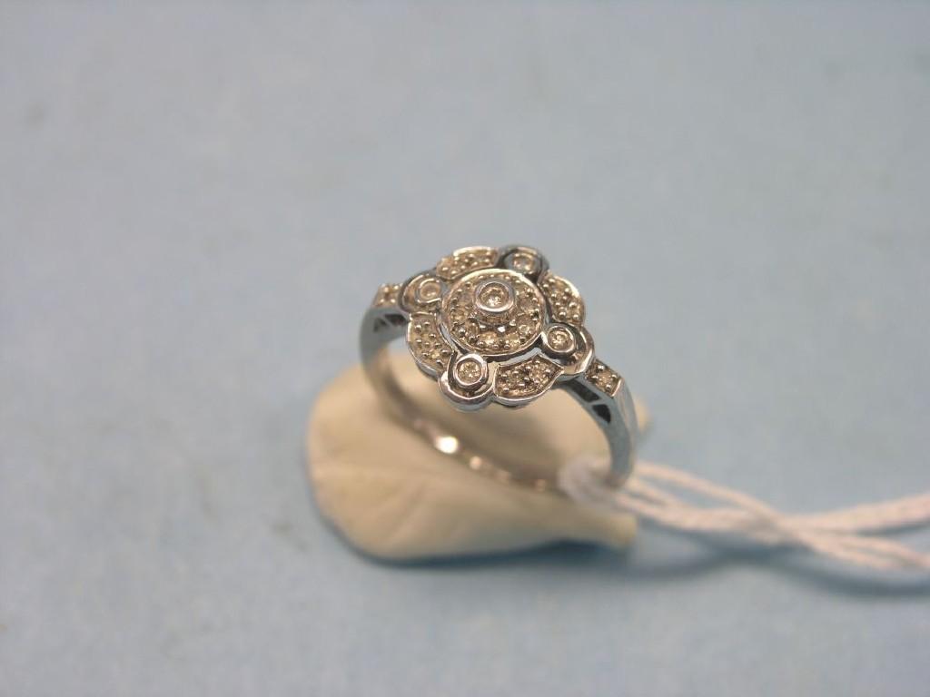 Appraisal: An ct white gold and diamond ring rosette design ring