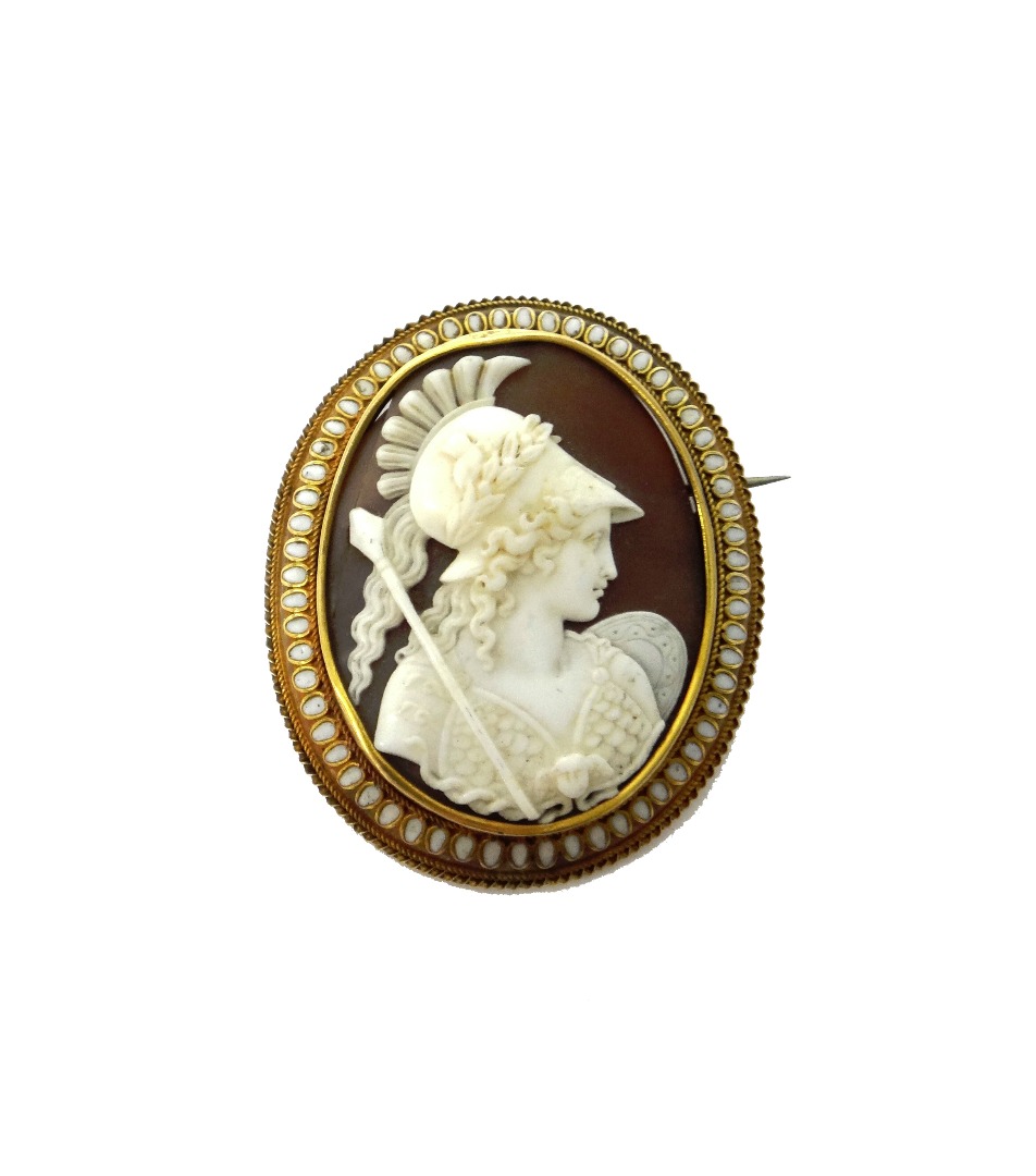 Appraisal: A Victorian gold and white enamel mounted oval shell cameo