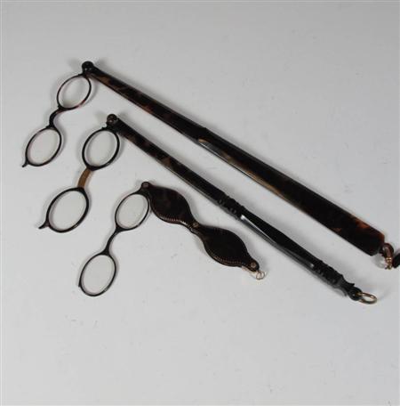 Appraisal: Three th century tortoise shell lorgnettes each lorgnette folds into