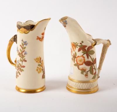 Appraisal: Two Royal Worcester blush ivory tusk jugs and cm and