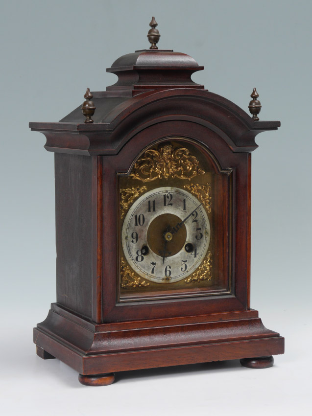 Appraisal: JUNGHANS GERMAN MAHOGANY BRACKET CLOCK Arched pediment with spire finial