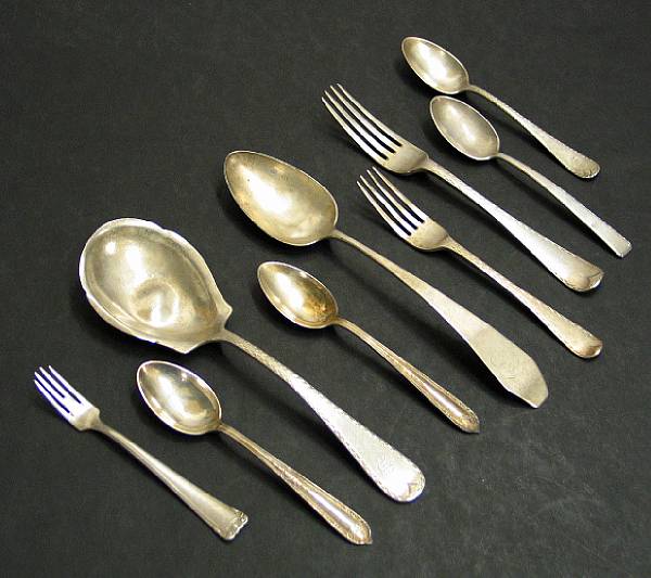 Appraisal: A mixed silver flatware group Comprising silver Coffin tablespoon monogrammed