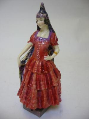 Appraisal: A ROYAL DOULTON PORCELAIN FIGURE SPANISH LADY wearing a purple