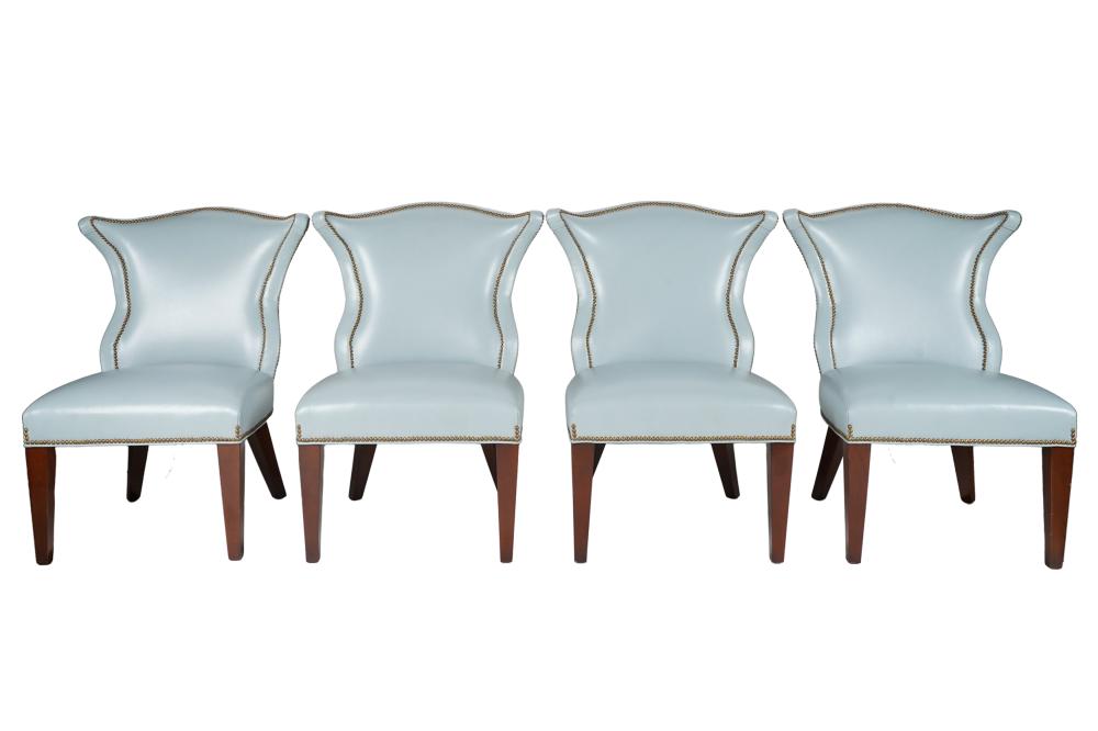 Appraisal: SET OF FOUR BLUE LEATHER CHAIRSunsigned each with floral textured