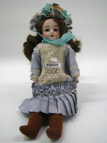 Appraisal: Antique bisque-head Kestner doll cloth body marked on back of