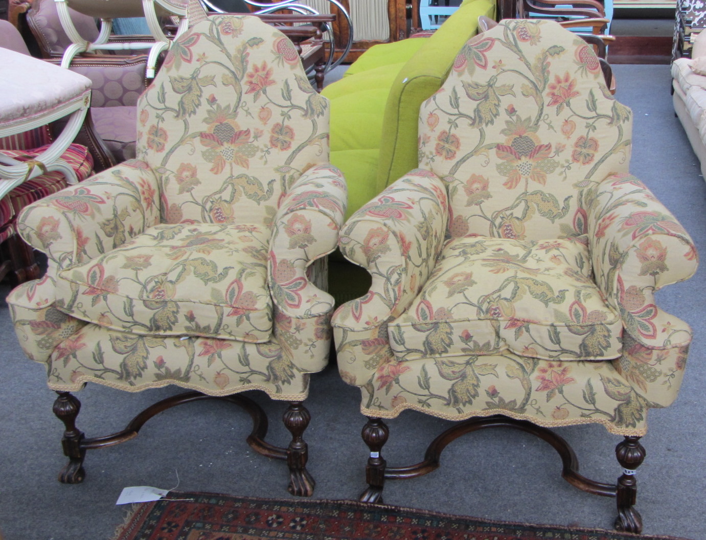 Appraisal: A pair of Flemish th century style hump back armchairs